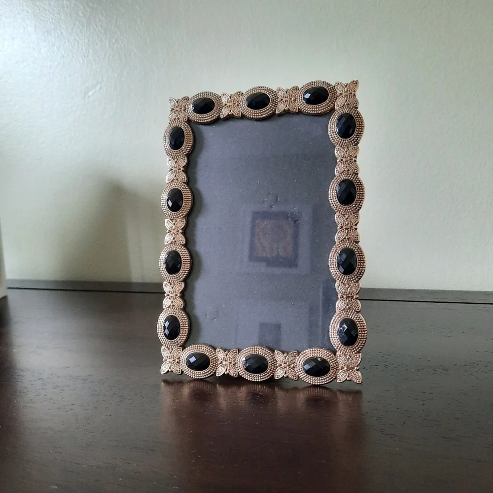 Gold tone metal picture frame